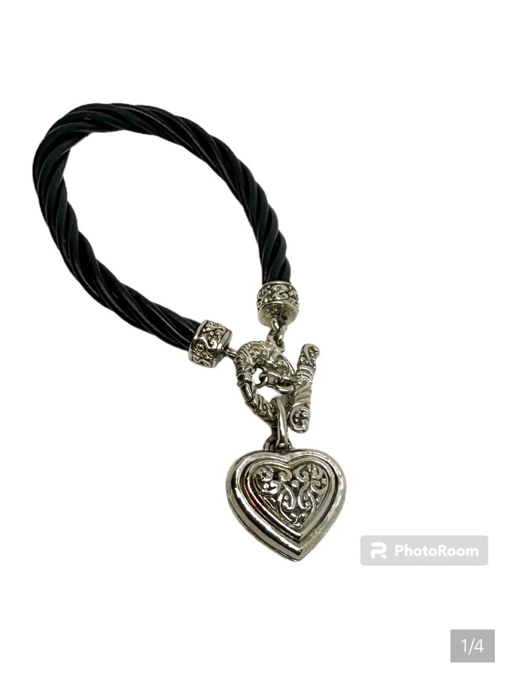 Silver tone heart bracelet on 3-strand twisted cord Women’s costume jewelry